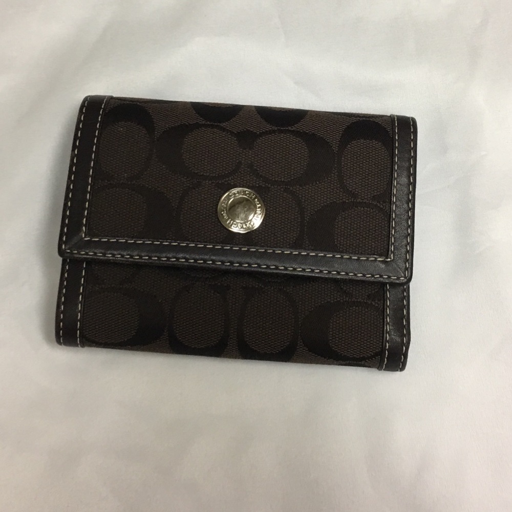 Used brown Coach wallet.